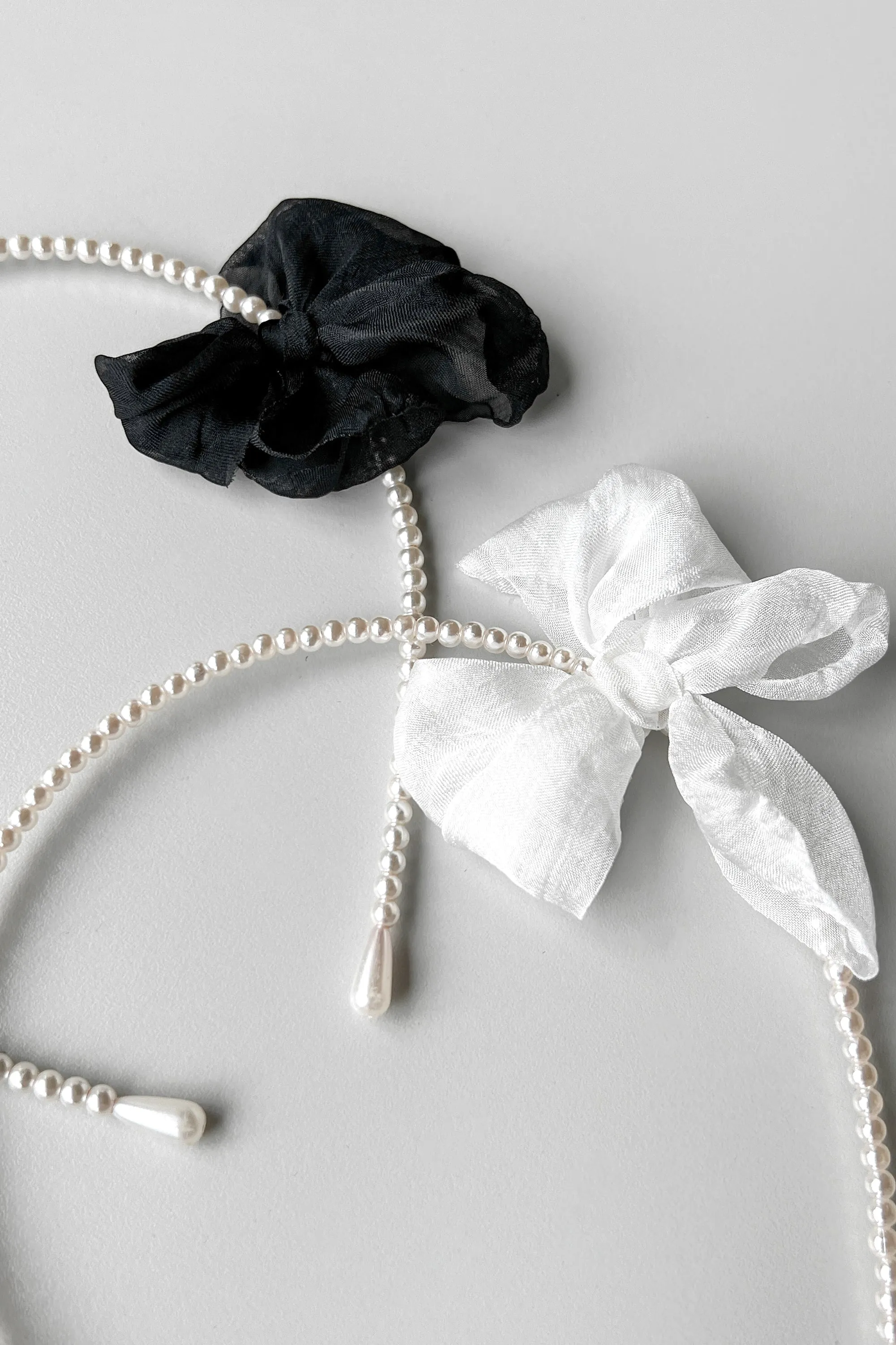 BEADED HEADBAND WITH BOW