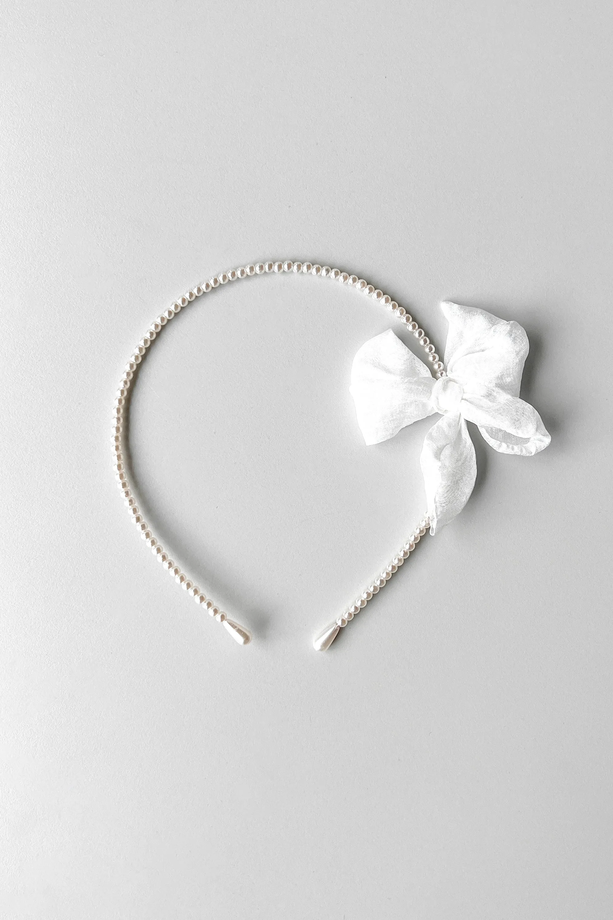 BEADED HEADBAND WITH BOW