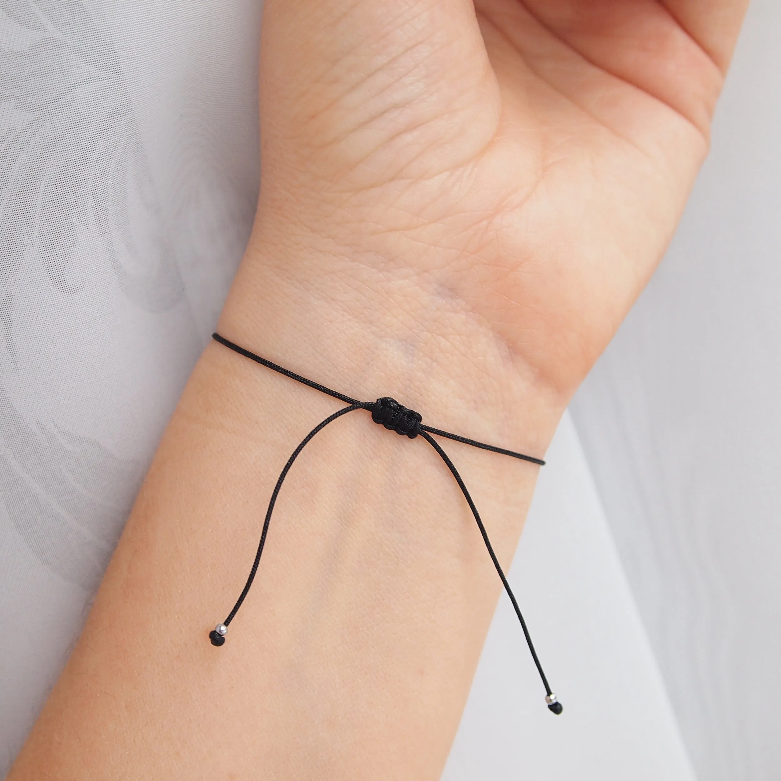 Custom morse code bracelets in black and white