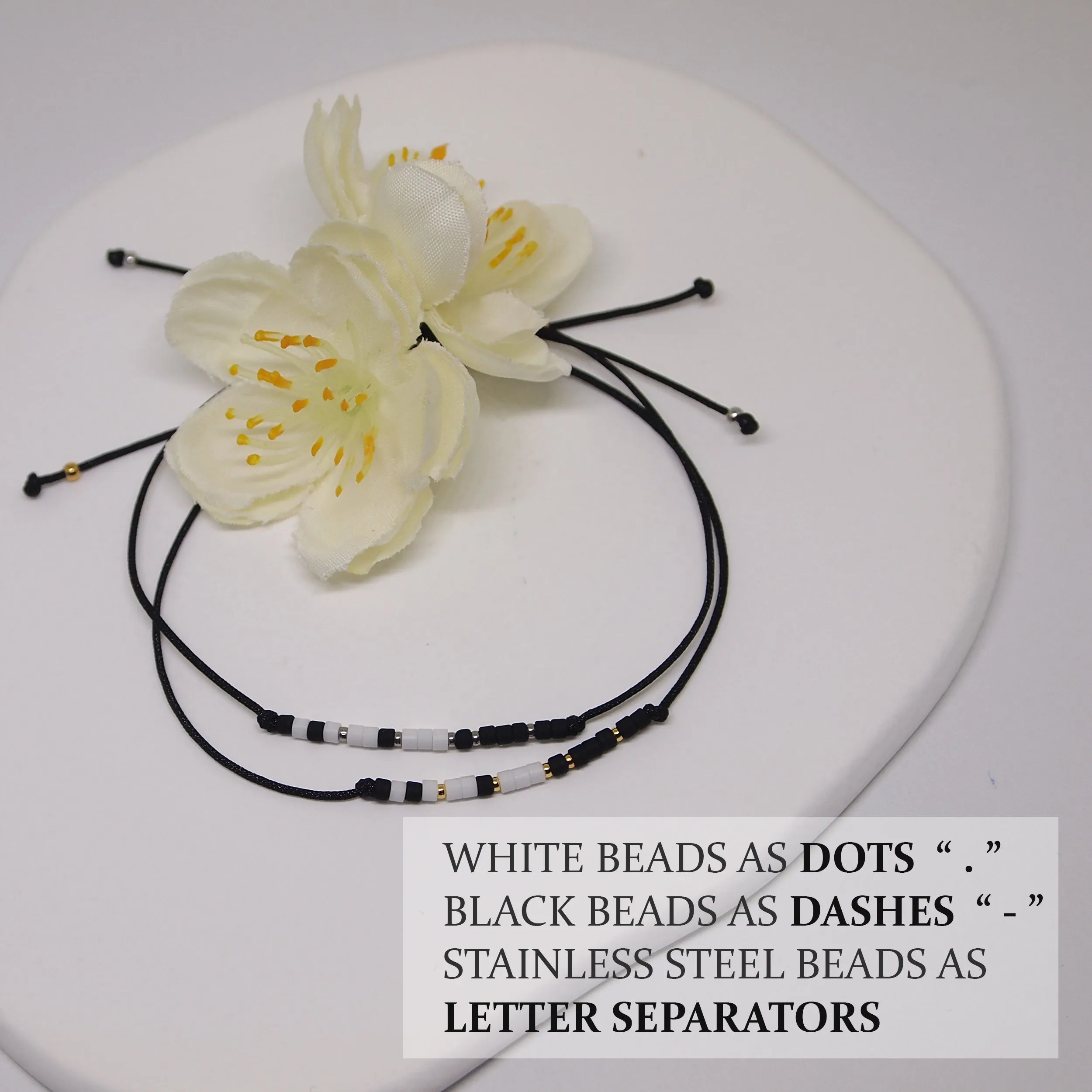 Custom morse code bracelets in black and white