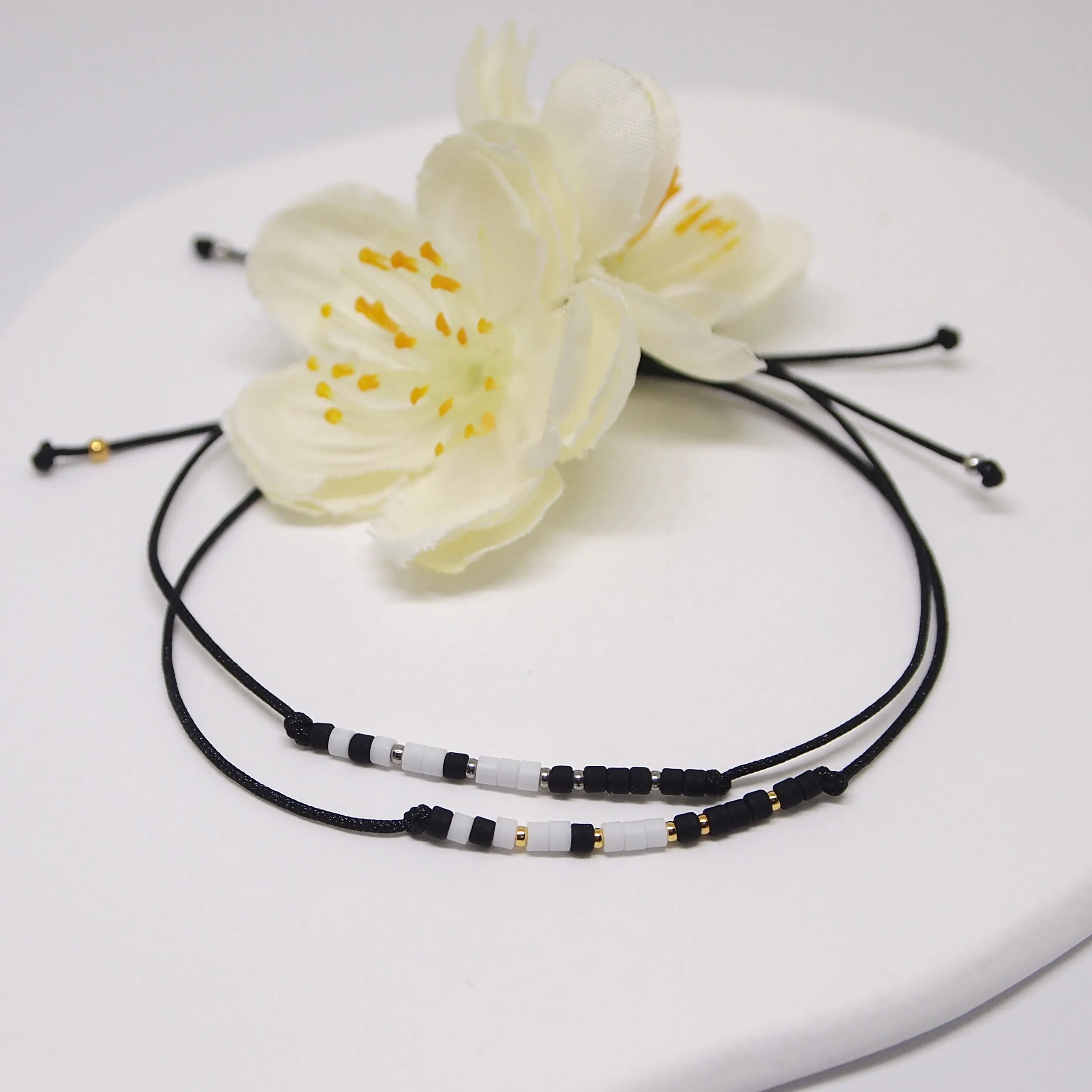 Custom morse code bracelets in black and white